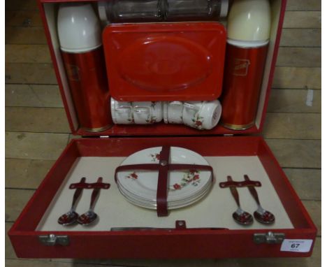 A Vintage Brexton fitted picnic set, in red case 