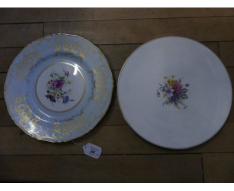 Two Royal Worcester hand painted cabinet platesOf circular form, each having floral decoration, one example surrounded by gil