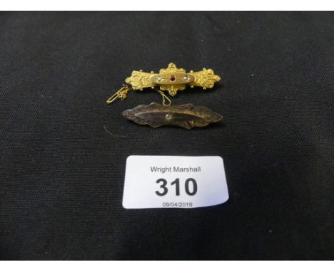 Two brooches to include an early 20th Century 9ct gold ruby and split pearl bar brooch and one other, weight of hallmarked br