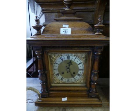 A late 19th/early 20th Century bracket clock, in architectural case with brass twin train movement 