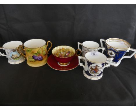 A mixed lot comprising an Aynsley fruit decorated cup and saucer bearing signature Jones together with a further Brookdale do