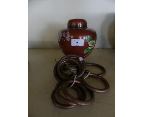 A 20th Century cloisonne ginger jar decorated with flowers together with a selection of vintage copper bull rings 
