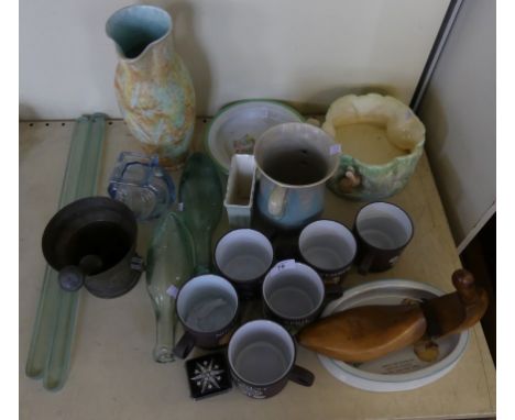 A mixed lot comprising Hornsea pottery mugs, Shelley, Mabel Lucie Attwell babies dish, vintage glass bottles, brass pestle an
