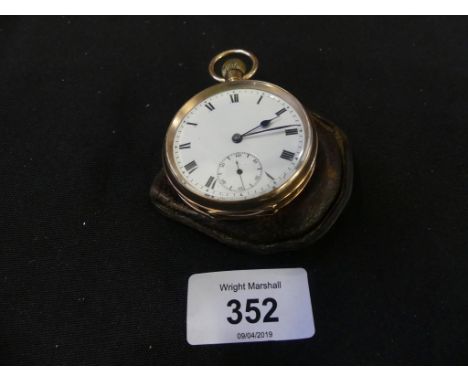 A 9ct gold open face pocket watch, the white enamel dial with Roman numeral hour markers and subsidiary seconds dial, movemen