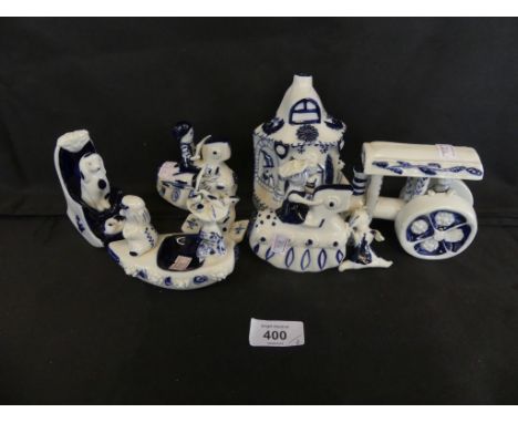 A collection of Wilfred Gibson pottery models to include traction engine, various rocking ornaments and a small money box