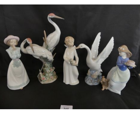 A Lladro model of two cranes together with four various Nao models (5) 