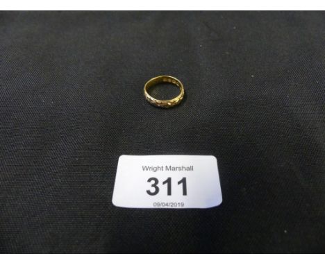 A 22ct gold band ring with an engraved floral pattern , ring size K, weight approx 4.4gADDITIONAL INFO/CONDITION REPORTGenera