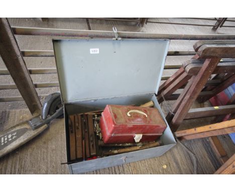 A metal toolbox and contents of various tools to include moulding planes, hammers and a plastic toolbox of further tools