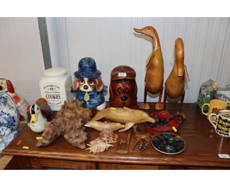 Two wooden ducks; various other ornaments; enamel chamber stick; biscuit jars etc