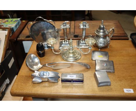 A collection of metal ware to include Art Deco style ash tray, cigarette cases, candlesticks, table lighter etc.