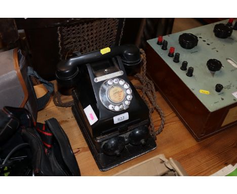 A vintage rotary dial telephone