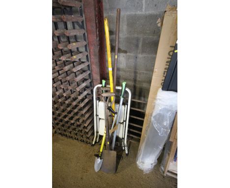 A quantity of long handled garden tools, to include spade, rake, shears and a small set of metal folding steps