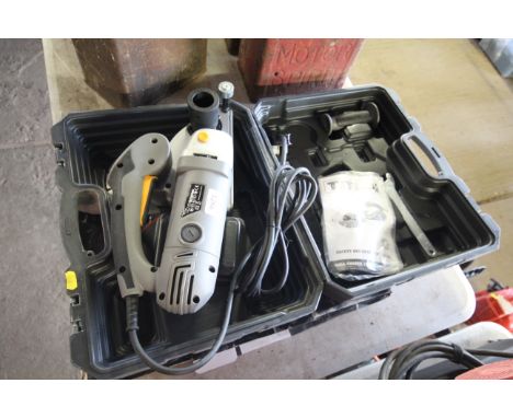 A Titan TTB293WCH 240V wall chaser (as new in fitted plastic case) with instruction manual, accessories, cutting blade etc.