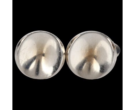 GEORG JENSEN - a pair of Danish modernist sterling silver cufflinks, designed by Nanna Ditzel, model no. 74C, panel diameter 