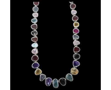 A silver gem set fringe necklace, set with rough-cut gemstones, including amethyst citrine topaz ruby etc, necklace length 41