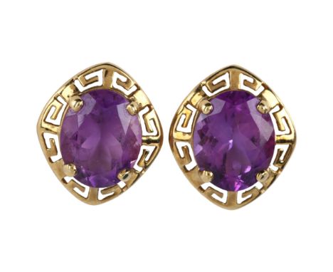 A pair of amethyst earrings, unmarked gold Greek Key design with oval mixed-cut amethyst, earring height 14.7mm, 2.7gNo damag
