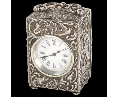 A Victorian silver boudoir carriage clock, by Mappin Brothers, hallmarks London 1896, allover foliate embossed decoration, ca