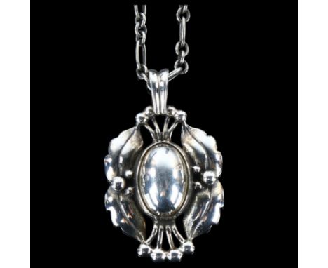 GEORG JENSEN - a Danish sterling silver pendant necklace of the year 2000, on silver chain, pendant height 31.4mm, chain leng