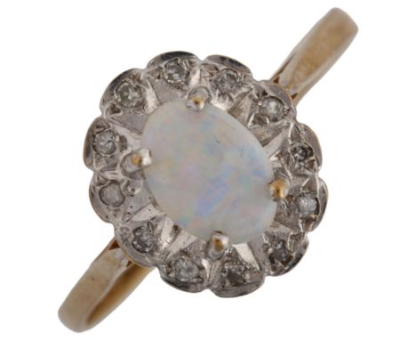 A 9ct gold opal and diamond cluster ring, set with oval cabochon opal and single-cut diamonds, setting height 11.3mm, size N,