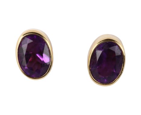 A pair of 9ct gold amethyst earrings, with stud fittings, earring height 9mm, 1.5gNo damage or repairs, all stones present, s