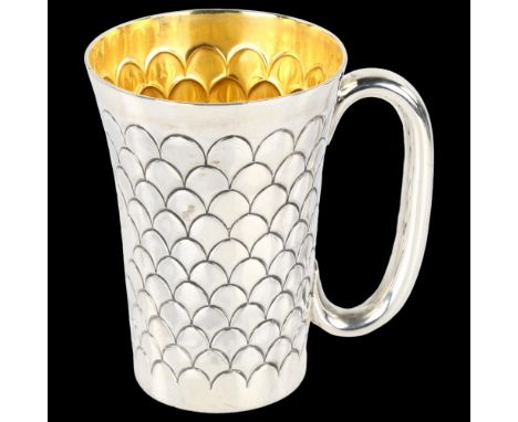 A Victorian silver mug, tapered cylindrical form with scale decoration and gilt interior, by Martin, Hall & Co, hallmarks Lon