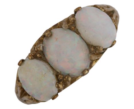 A 9ct gold three stone opal half hoop ring, set with oval cabochon opal, setting height 8.6mm, size N, 2.8gNo damage or repai