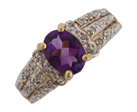 A modern 9ct gold amethyst and diamond dress ring, set with oval mixed-cut amethyst and single-cut diamonds, setting height 7