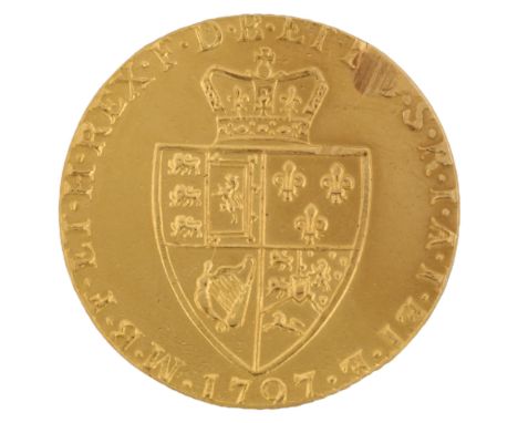A George III 1797 gold spade guinea coin, 8.1gReverse has a filing mark in top right corner, otherwise only very light surfac