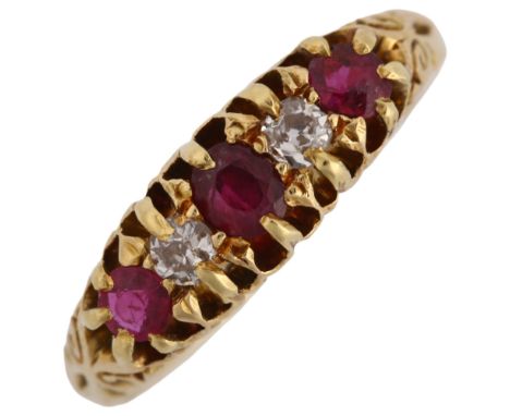 An early 20th century 18ct gold five stone ruby and diamond half hoop ring, maker's marks AM, hallmarks Birmingham 1910, sett