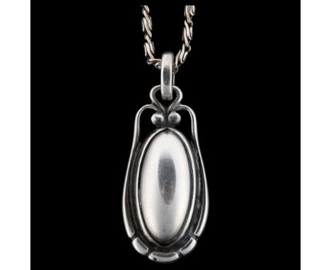 GEORG JENSEN - a Danish modernist sterling silver pendant necklace of the year 2000, on silver fancy link chain, pendant heig