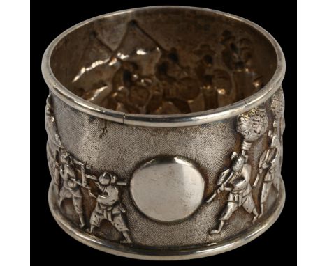 A Chinese export silver napkin ring, musical procession decoration, by Tuck Chang, circa 1900, diameter 5cm, 0.9ozNo damage o