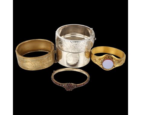 4 hinged bangles, including Bohemian garnet example, 111.4g total (4)Lot sold as seen unless specific item(s) requested 