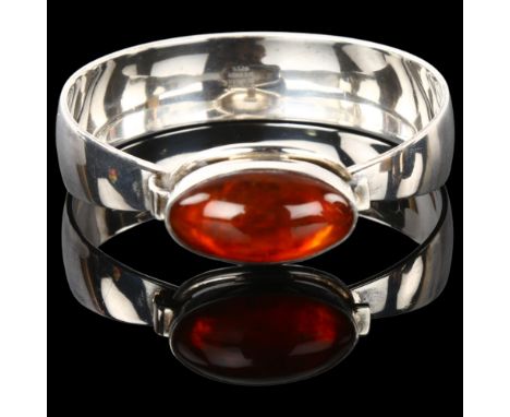 NIELS ERIK FROM - a Danish modernist sterling silver and amber bracelet, setting height 18.4mm, internal circumference 16.5cm