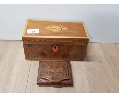 INLAID WALNUT TEA CADDY TOGETHER WITH CARVED WOOD CIGAR HOLDER