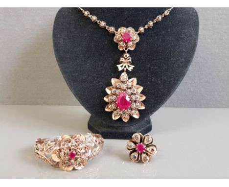 MATCHING ROSE GOLD RUBY AND DIAMOND TRIO SET INCLUDES FLOWER RING, DOUBLE CLUSTER NECKLACE AND FLOWER CLUSTER BANGLE TOTAL WE