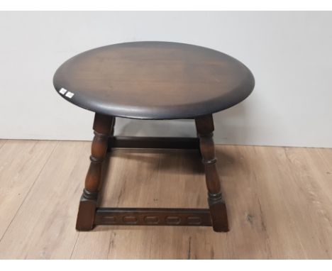 A CIRCULAR TOPPED OLD CHARM LAMP TABLE