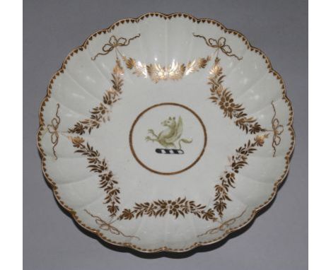 A Worcester gilt swag painted fluted shallow dish, with griffin crest, 8.25in.