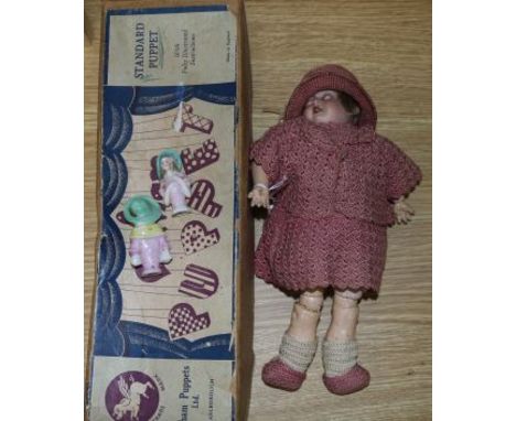 A French bisque headed doll, Pelham puppet and 2 pin dollies