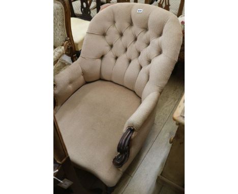 A button back scrolled arm nursing chair