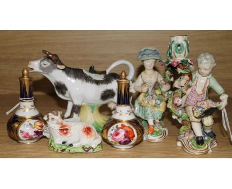 A pair of Minton candlestick figures, pseudo cross swords mark, a pair of Derby scent bottles c.1810, a pearlware ram and a D