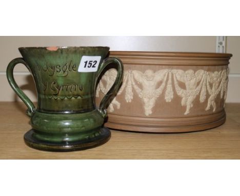 A Doulton Silicon ware planter and a Ewenny pottery loving cup