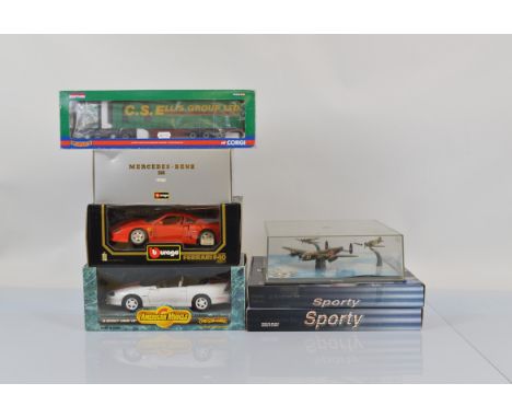 A mixed lot of large scale diecast models, including a Corgi 1:50 truck, Bburago Mercedes Benz SSK 1928 model, two trade pack