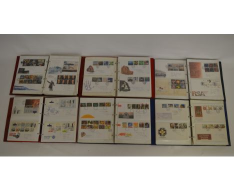 Twelve albums containing First Day Covers, each album containing a large quantity of FDCs with dates ranging from mid-20th ce