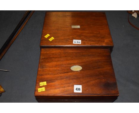 Two 19th Century rosewood work boxes, with mother-of-pearl inlay, cartouches and escutcheons, opening to reveal lift-out tray