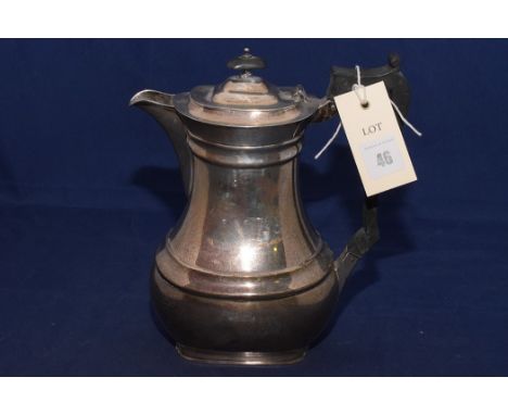 A George V silver hot water jug, by William Hutton & sons Ltd. 1924, with ebony handle and finial, 23oz. gross.