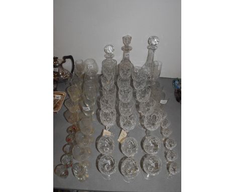 Cut glassware, to include: decanters; wine glasses; tumblers; together with a set of five shot glasses decorated hunting scen