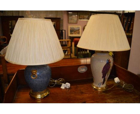 A large modern ceramic table lamp and shade; and another similar lamp.