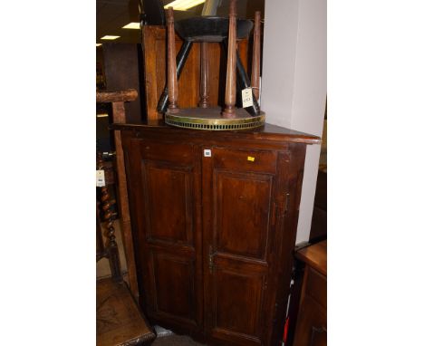 A stained wood corner cabinet, 80cms wide; together with a floral painted tripod stool; and an occasional table with brass ga