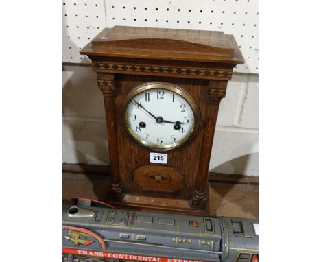     An Edwardian Oak &amp; Boxwood Inlaid Encased Mantel Clock With Circular Dial       