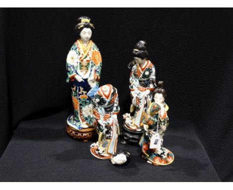     A Group Of Four Oriental Ceramic Geisha Girl Figures In Brightly Coloured Dress (All AF)                                 